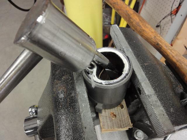 Expansion Ring Removal Tool Being Levered